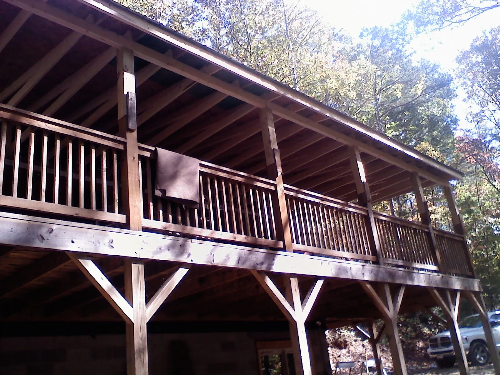 Timber framing under a new elevated porch and deck — Roof Leak Repair in Beckley by Roofing Brothers